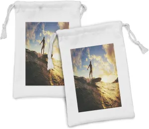 Ambesonne Ride the Wave Fabric Pouch Set of 2, Sunset Surf in the Ocean Young Woman Under Dramatic Sky Exotic Hobby Image, Small Drawstring Bag for Toiletries Masks and Favors, 9" x 6", Sepia Blue