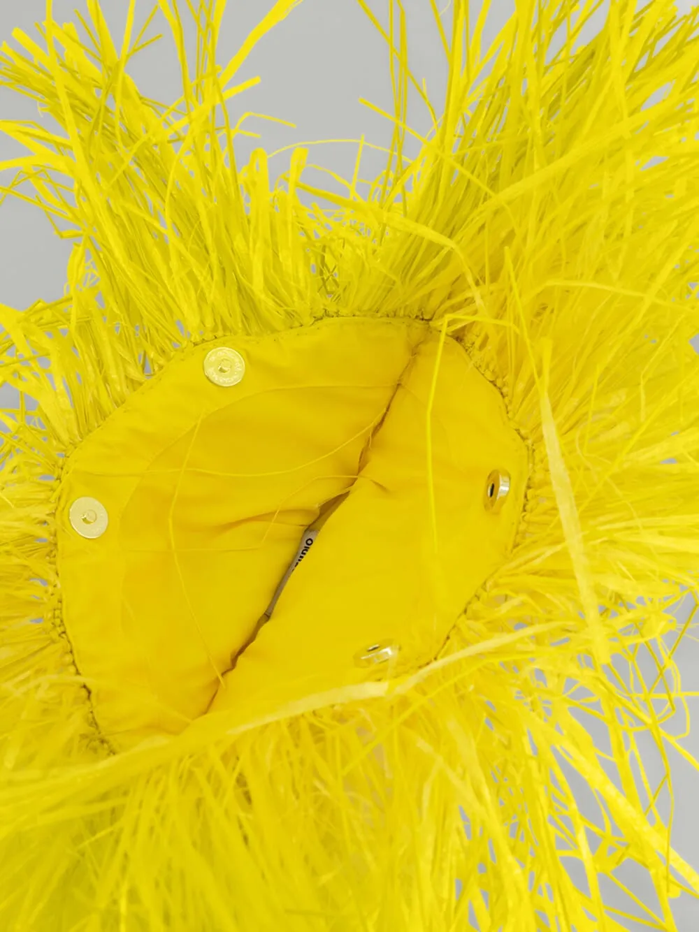 Frayed seashell clutch
