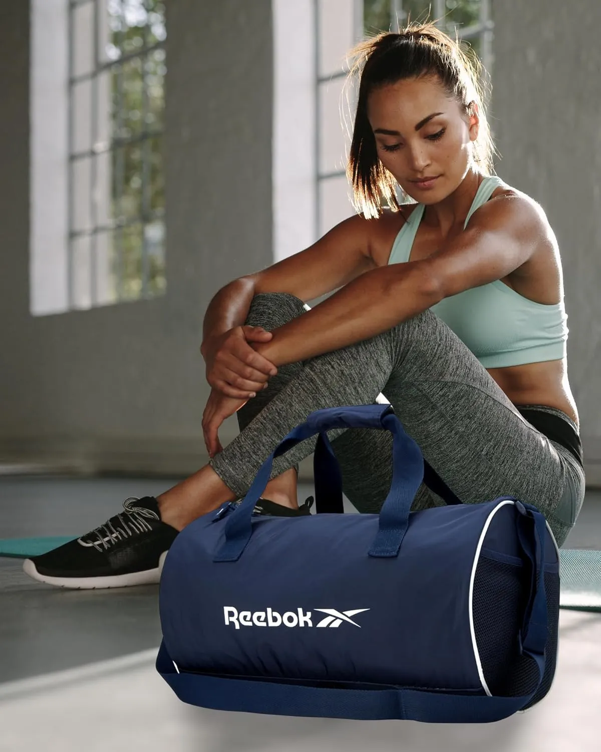 Reebok Duffle Bag – Gym Bag for Women & Men, Carry On and Overnight Duffle for Travel & Fitness, Size Small, Kellan II Blue