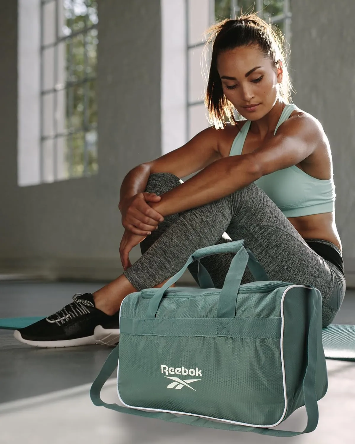 Reebok Duffle Bag – Gym Bag for Women & Men, Carry On and Overnight Duffle for Travel & Fitness, Size Small, Warrior II Green