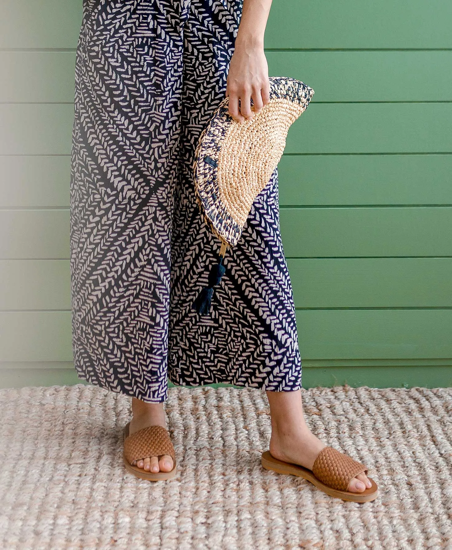Woven Crescent Pom Pom Clutch
